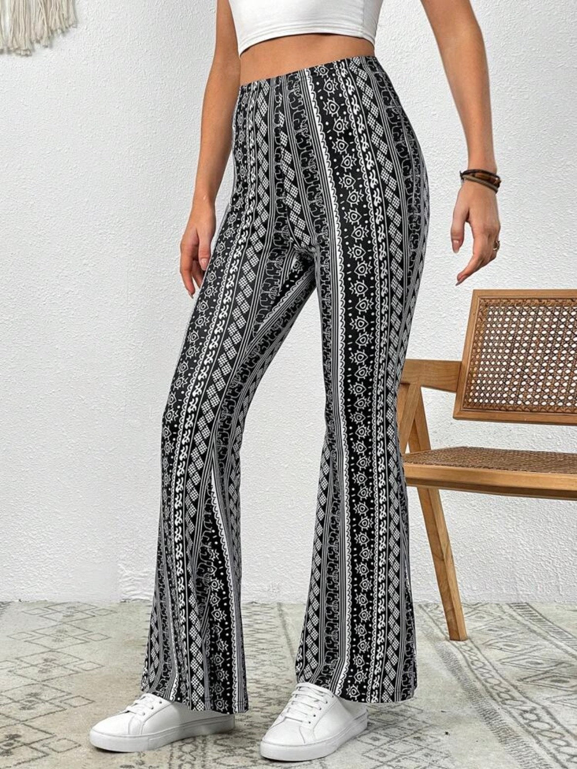 Forbidden Pants with the black design being showcased from the first angle.